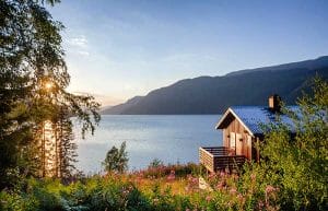 Sustainable Building Design | Outside image of House next to Lake